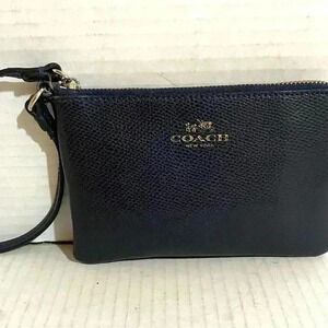 Coach navy blue leather wristlet